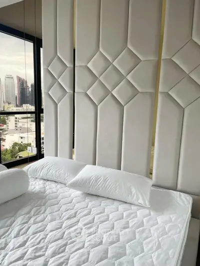 Luxurious modern bedroom with stunning city view and elegant wall design
