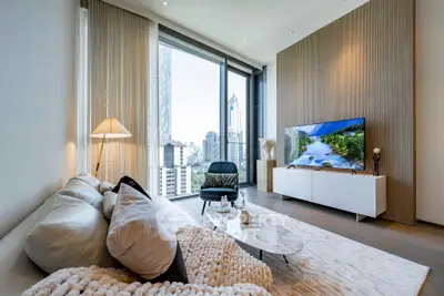 Luxurious modern living room with stunning city view and elegant decor