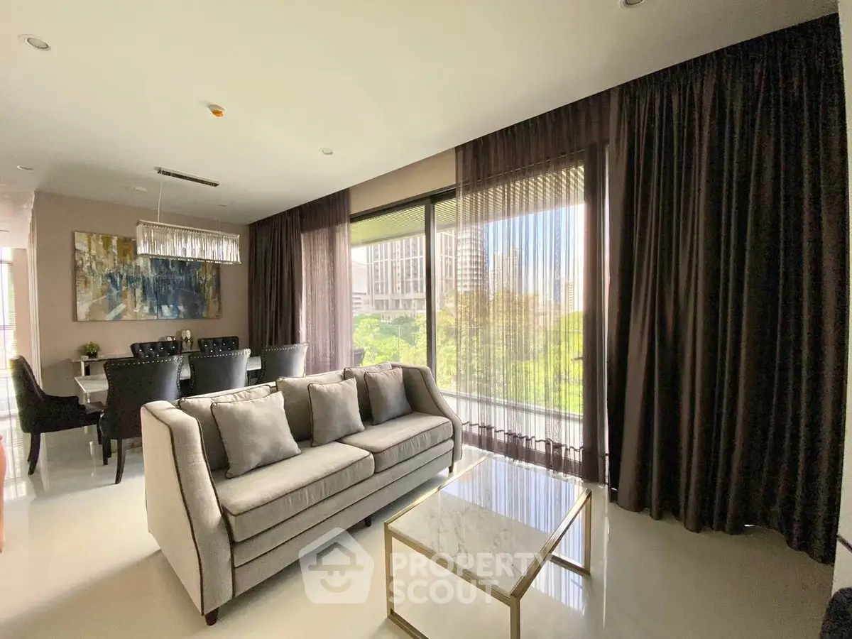 Luxurious living room with elegant decor and stunning city view, featuring a modern sofa and chic dining area.