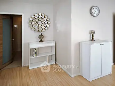 Modern interior with stylish decor and wooden flooring in a cozy living space.