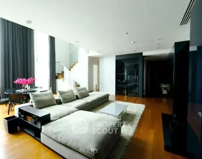 Luxurious modern living room with plush seating and elegant decor