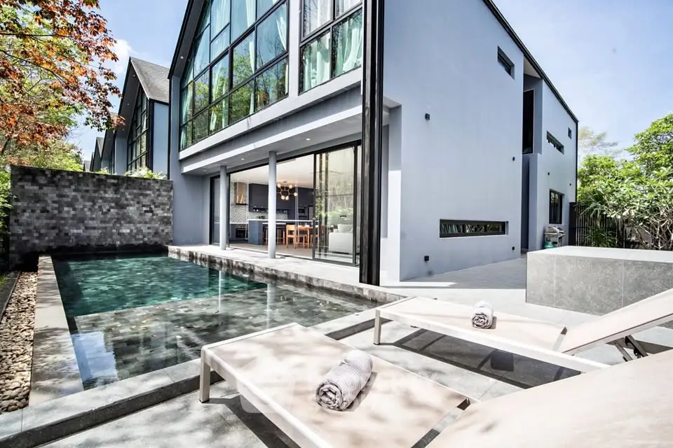 Luxurious modern villa with private pool and spacious outdoor area, perfect for relaxation and entertainment.