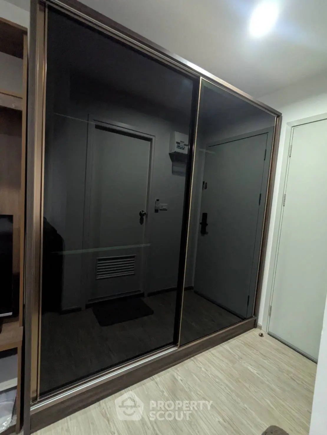 Modern interior with sleek sliding door wardrobe and minimalist design