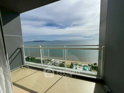 Stunning ocean view from modern balcony in high-rise apartment