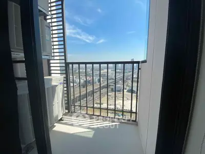 Charming balcony with stunning city view and modern railings, perfect for urban living.