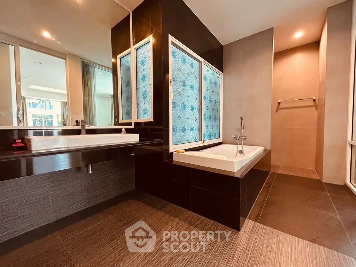 Luxurious modern bathroom with elegant bathtub and stylish design