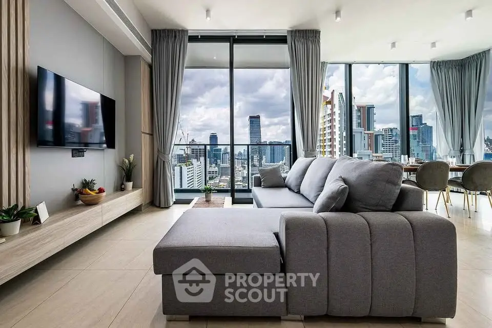 Luxurious modern living room with panoramic city view and elegant decor