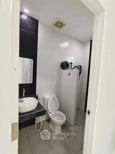 Modern bathroom with sleek design and white fixtures