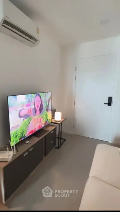 Modern living room with sleek design and vibrant wall art