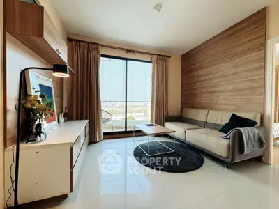 Modern living room with large window and stylish decor