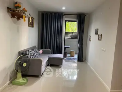 Cozy living room with modern sofa and balcony view