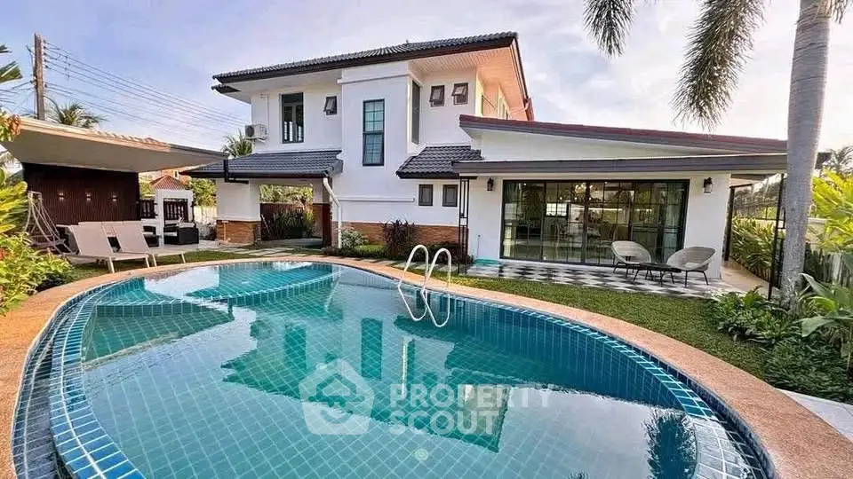Luxurious villa with private pool and lush garden, perfect for serene living and entertaining.