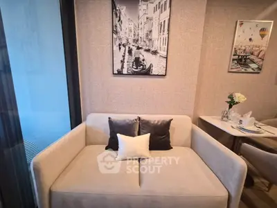 Chic living room with cozy sofa and elegant decor in modern apartment
