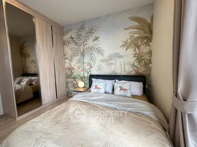 Luxurious bedroom with elegant wallpaper and mirrored wardrobe doors