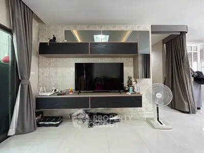 Modern living room with sleek entertainment center and stylish decor