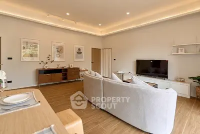 Spacious modern living room with elegant decor and cozy seating area