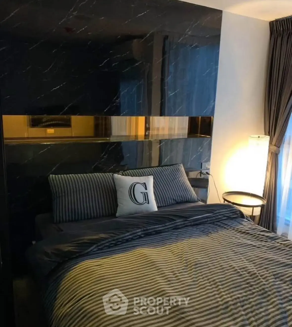 Luxurious bedroom with elegant decor and ambient lighting