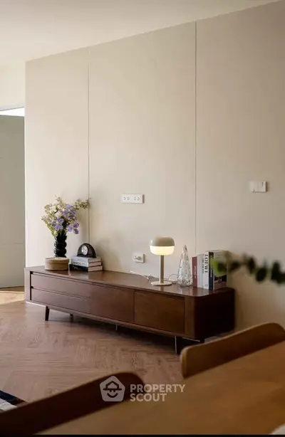 Stylish modern living room with elegant wooden furniture and soft lighting