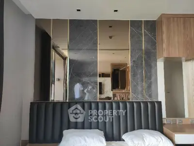 Luxurious bedroom with modern design and elegant marble accents