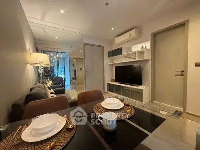 Modern living room with dining area, stylish decor, and cozy ambiance