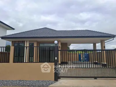Charming single-story home with modern design and spacious driveway, perfect for family living.