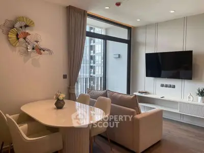 Modern living room with stylish decor and balcony view
