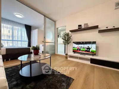 Modern living room with sleek decor and natural light