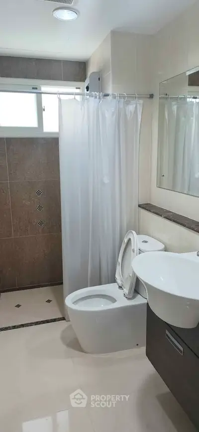 Modern bathroom with sleek fixtures and elegant tile design