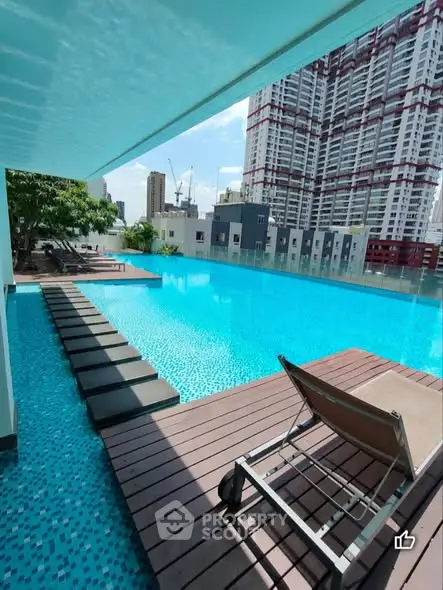 Luxurious rooftop pool with stunning cityscape views and modern design.