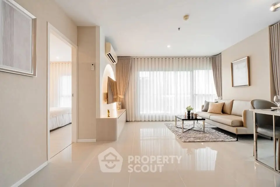 Spacious modern living room with elegant decor and natural light