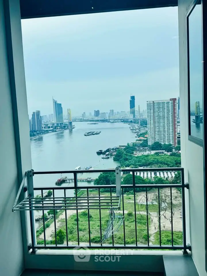 Stunning river view from high-rise balcony with city skyline