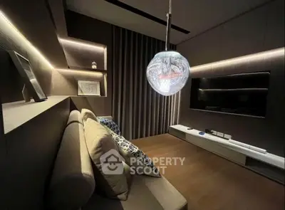 Modern living room with stylish lighting and sleek TV setup