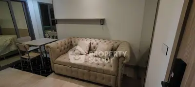 Cozy living room with elegant beige sofa and modern decor