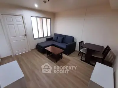 Cozy living room with modern furniture and wooden flooring