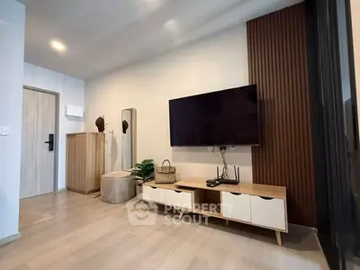 Modern living room with wall-mounted TV and stylish wooden furniture
