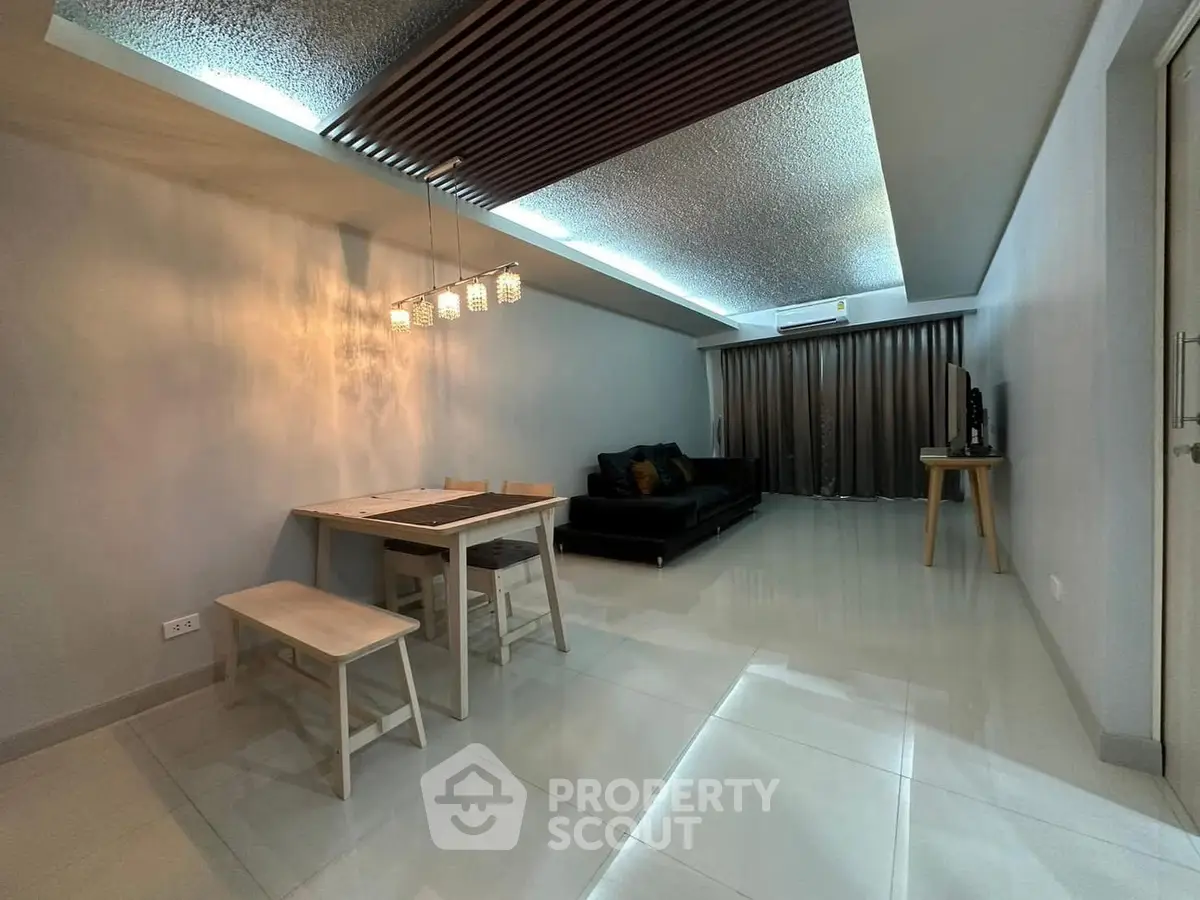 Modern living room with sleek furniture and stylish lighting