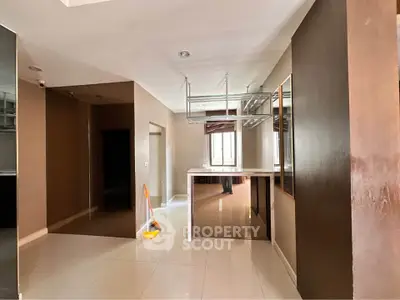 Spacious modern interior with sleek design and ample natural light, perfect for stylish urban living.