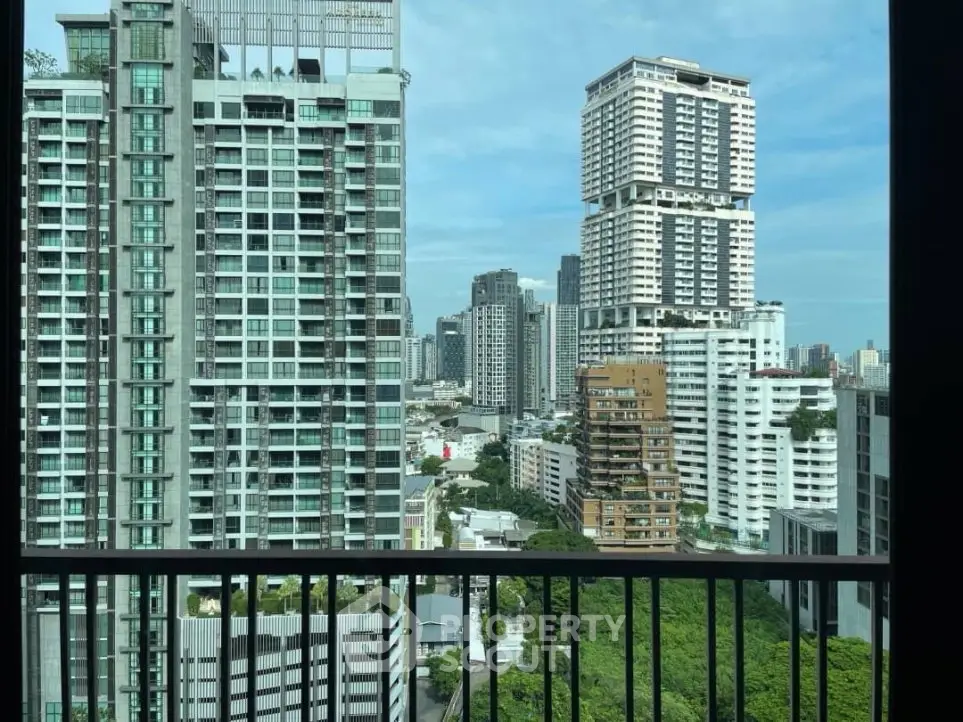 Stunning cityscape view from a high-rise balcony showcasing modern urban living.