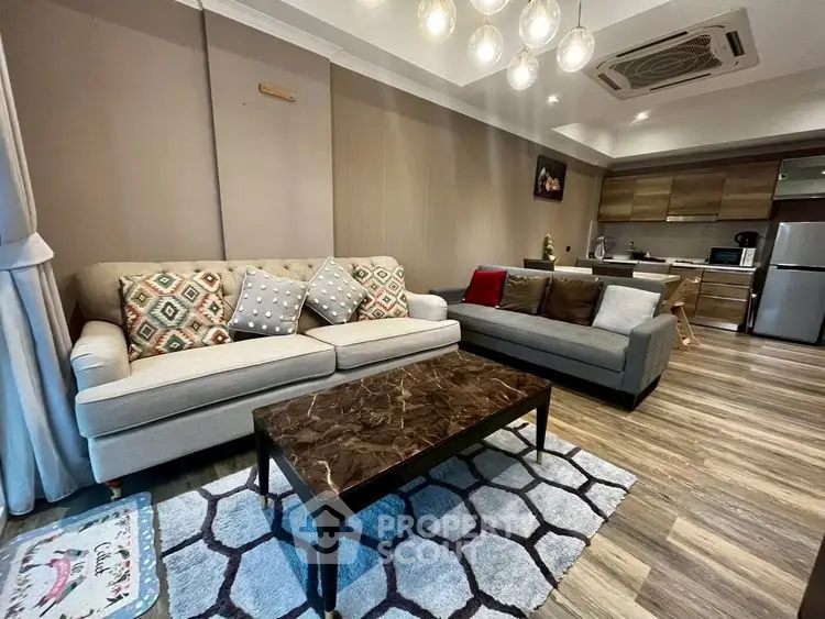 Stylish living room with modern furniture and open kitchen layout
