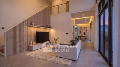 Luxurious modern living room with high ceilings and elegant decor