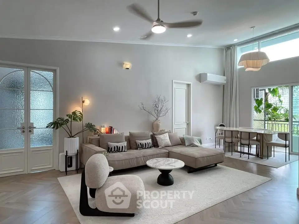 Spacious modern living room with elegant decor and natural light