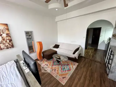 Cozy living room with modern decor and wooden flooring