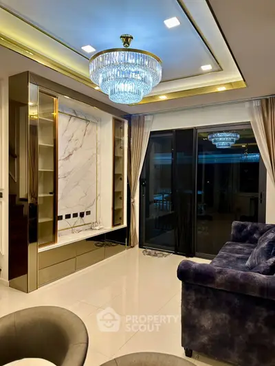 Luxurious living room with elegant chandelier and modern decor