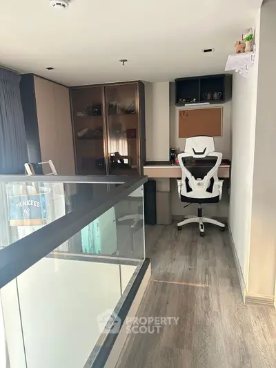 Modern study area with sleek desk and ergonomic chair, ideal for productivity and comfort.