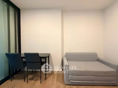 Modern living room with sleek furniture and minimalist design