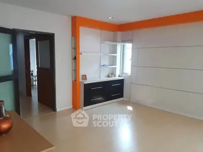 Spacious modern living room with sleek design and natural light