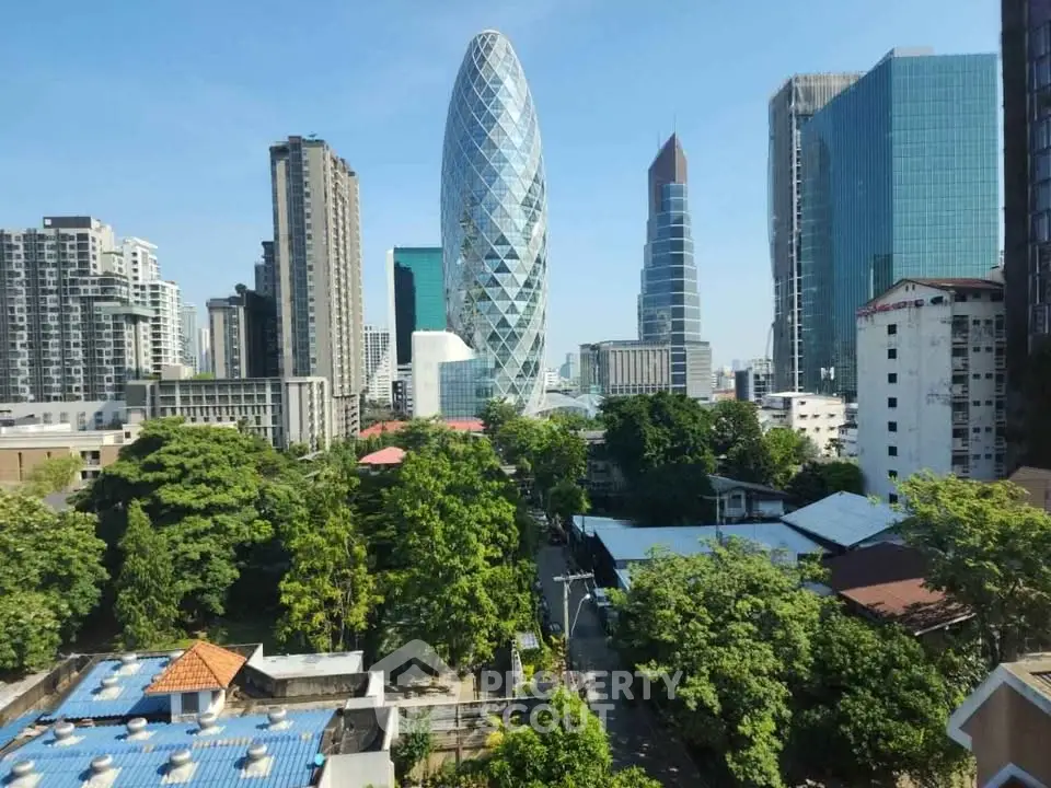 Stunning cityscape view with modern skyscrapers and lush greenery, showcasing urban living at its finest.