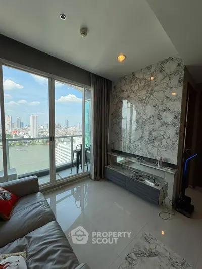 Luxurious living room with stunning city view and marble accent wall