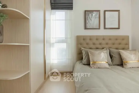 Modern bedroom with stylish decor and natural light