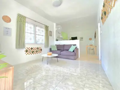 Bright and airy living room with modern decor and natural light